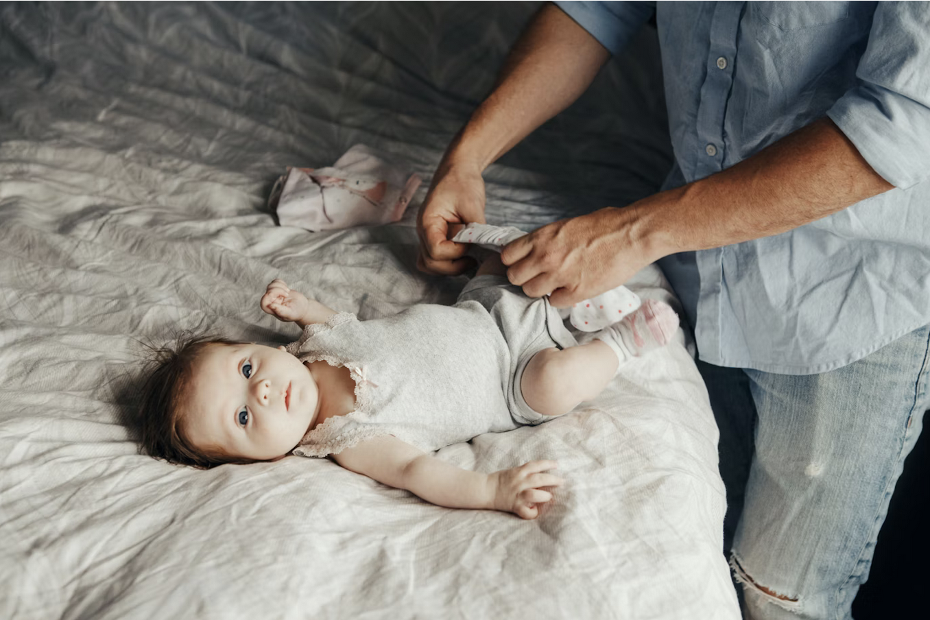 Dad caring for newborn in the first week